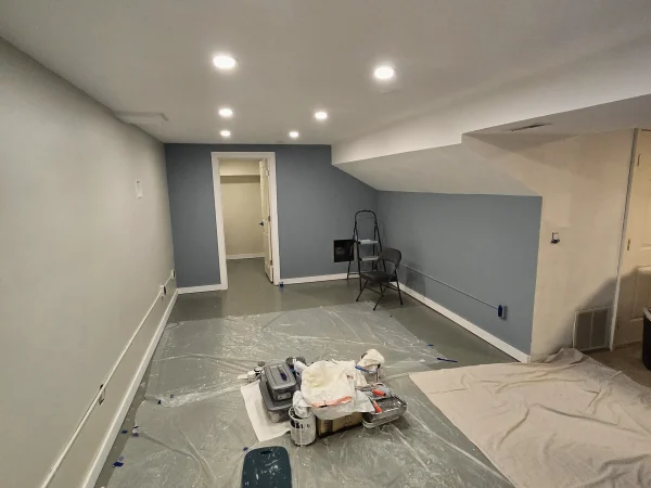 Painting prep and floor protection for a basement remodel project in East Missoula.