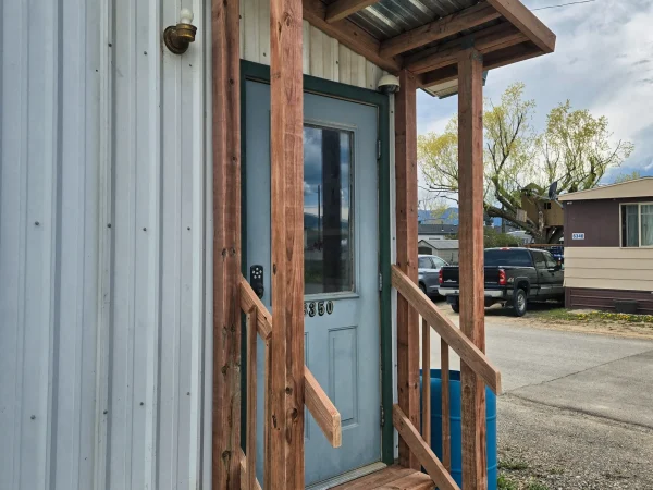 Roof framing for a commercial entryway awning in Missoula.