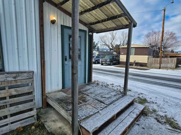 Commercial porch stairs with winter frost in Missoula.