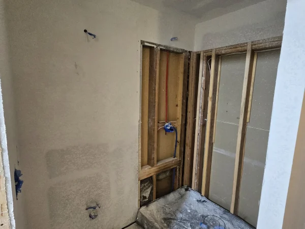 Drywall taping and mudding in a Missoula bathroom remodel project.