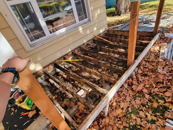 Rotted non-treated deck frame demolition in Missoula.