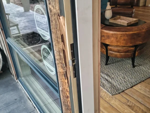 Close-up of a reinforced door jamb and security strike plate in Missoula.