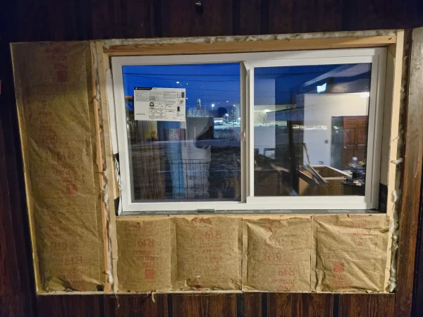 Interior view of resized window with R-19 insulation and framing.