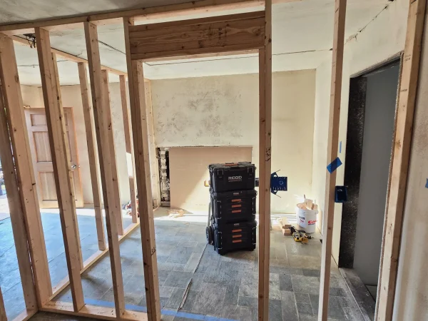 Wood stud framing for new interior walls in a Missoula home.